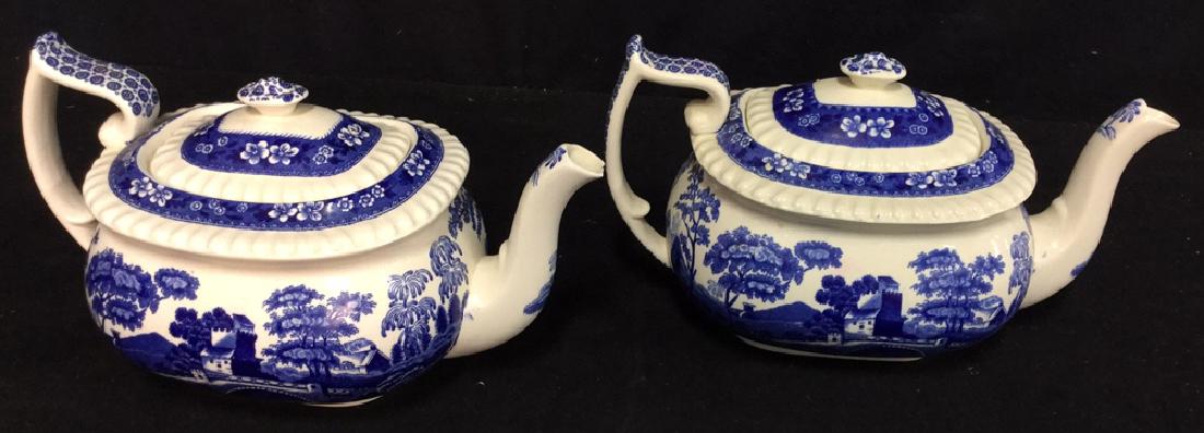 Pair of Copeland Spode's Tower Teapots: Made in England. Measure approx 5.5 inches H x 10 inches W x 5.5 inches D. Some chips on both spouts.