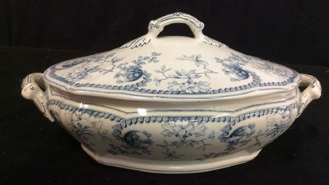 Antique Signed Lidded Porcelain Tureen, TGF Booth: measures 13 inches by 6.5 inches ht by 8 inches. condition: some yellowing and crazing.