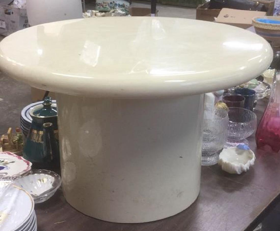 70's Style Mushroom Table: Lacquered cylindrical base with top which separates from base. . measures 14 inches tall by approx 9 1/2 inches diameter. No condition issues noted.