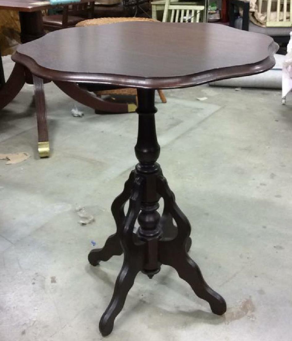 Mahogany Tilt Top Pie Table: Vintage scalloped edged pie table diameter measures approx 25 inches, carved pedestal base , height when open approx 43 inches. Property of Tudor Estate Westchester County New York, good condition.