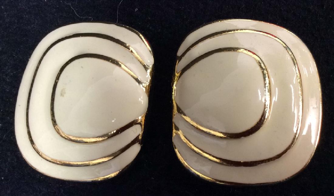 Estate Jewelry Clip On Enamel Earrings: Vintage Costume Jewelry Ivory Tone and gold tone vintage clip on earrings. Each measures approx 1 inch square. Property of Greenwich and Palm Beach estate.