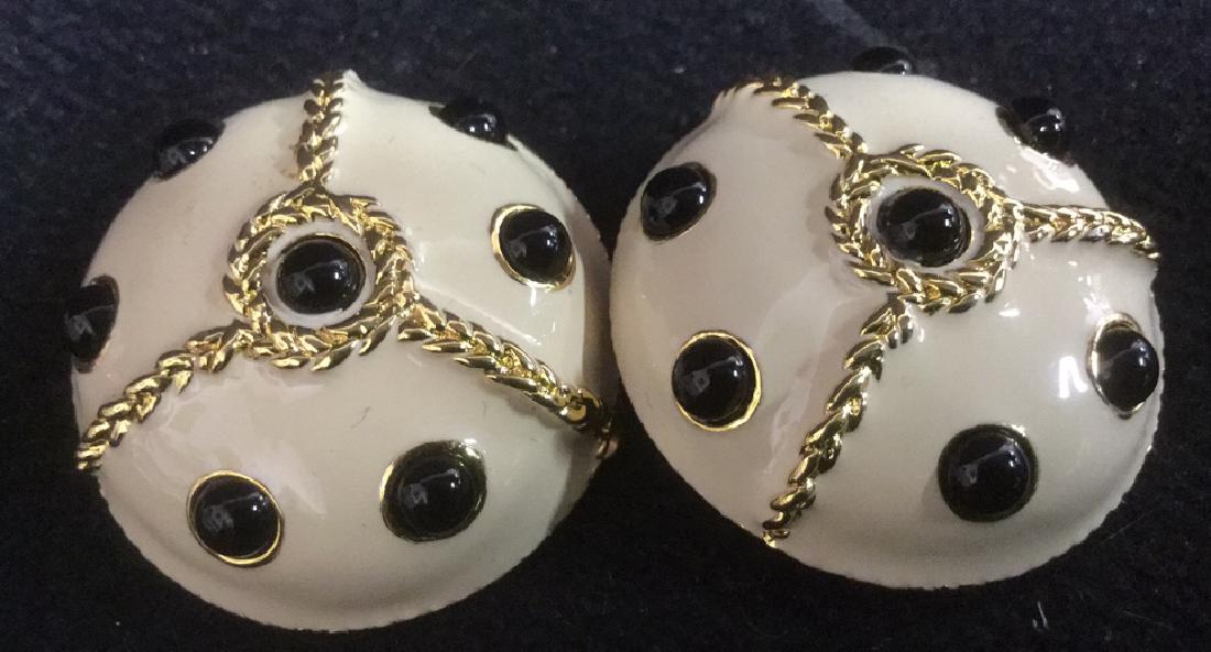 LES BERNARD Estate Enamel Gold Tone Earrings: Estate Vintage Jewelry, Vintage Costume Jewelry, Ivory tone and black enamel clip on earrings with gold tone trim. Marked for LES BERNARD. Each measures approx 1 1/2 inches diameter. Property of Green