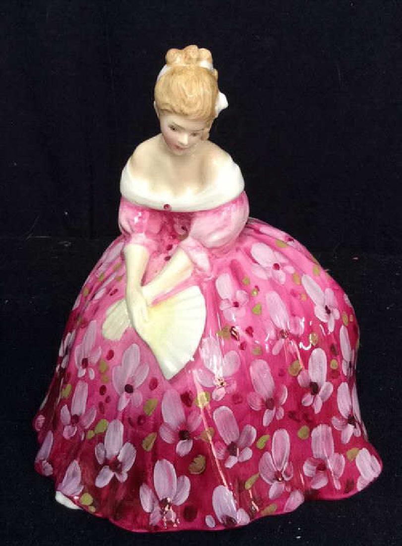 Royal Doulton Bone China 'Victoria' Statuette: Royal Doulton, collectible, bone china statuette of sitting lady in formal, floral, pink dress, named 'Victoria' Property of Greenwich and Palm Beach Estate. Measures approx 6 inches long and 5 inches