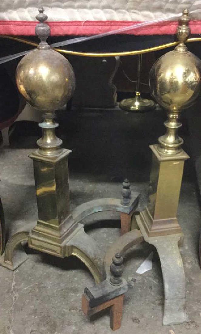 Pair Substantive Brass Spherical Andirons: vintage possibly antique heavy weight bass andirons. property of Greenwich and Palm Beach Estate. each measures ht 27 inches. Diameter of orbs approx 5 inches