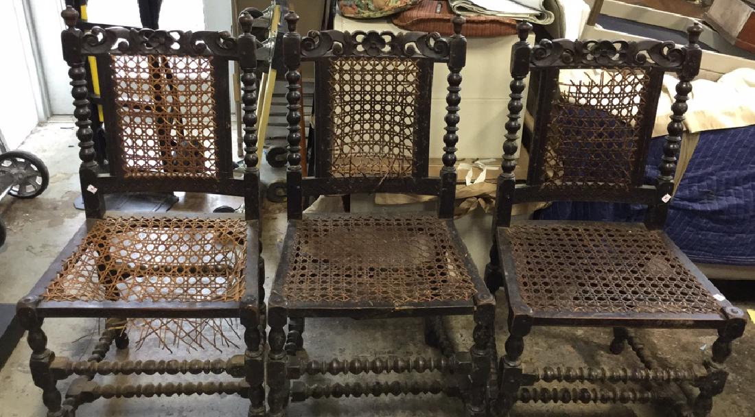 3 Antique Side Chairs: 3 antique, carved wood, wicker seats and backs. Measure approx 38. h x 19.5. W x 16.5 inches D. Some wicker needs repair. Overall condition consistent with age. Property of an historic Bedford farmhou