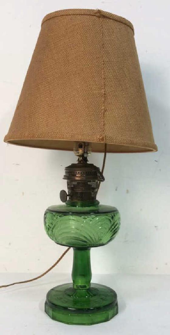 Vintage Green Glass Lamp: Property of antique Bedford Homestead circa 1700. lamp measures app 24 inches ht. marked for Aladdin made in USA.