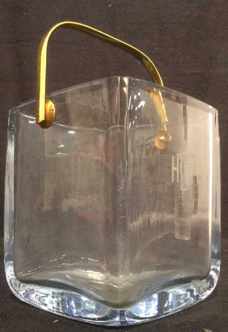 Square Glass Ice Bucket Brass Handle: Square Glass Ice Bucket with brass Handle. Measures approx 9 inches high with handle 6 inches square Monogrammed.