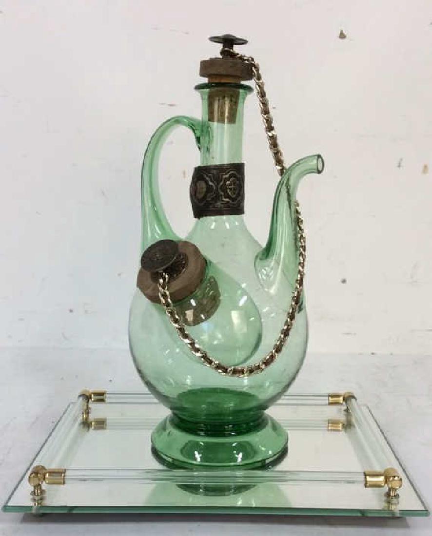 2 Table Top Acessories Wine Decanter Mirror: Lot of 2. 'Vintage Italian Hand Blown Corked Leather Wine Decanter with ice holder and railed mirror. Decanter Measures approx 13 inches high. Property of Greenwich and Palm Beach estate.