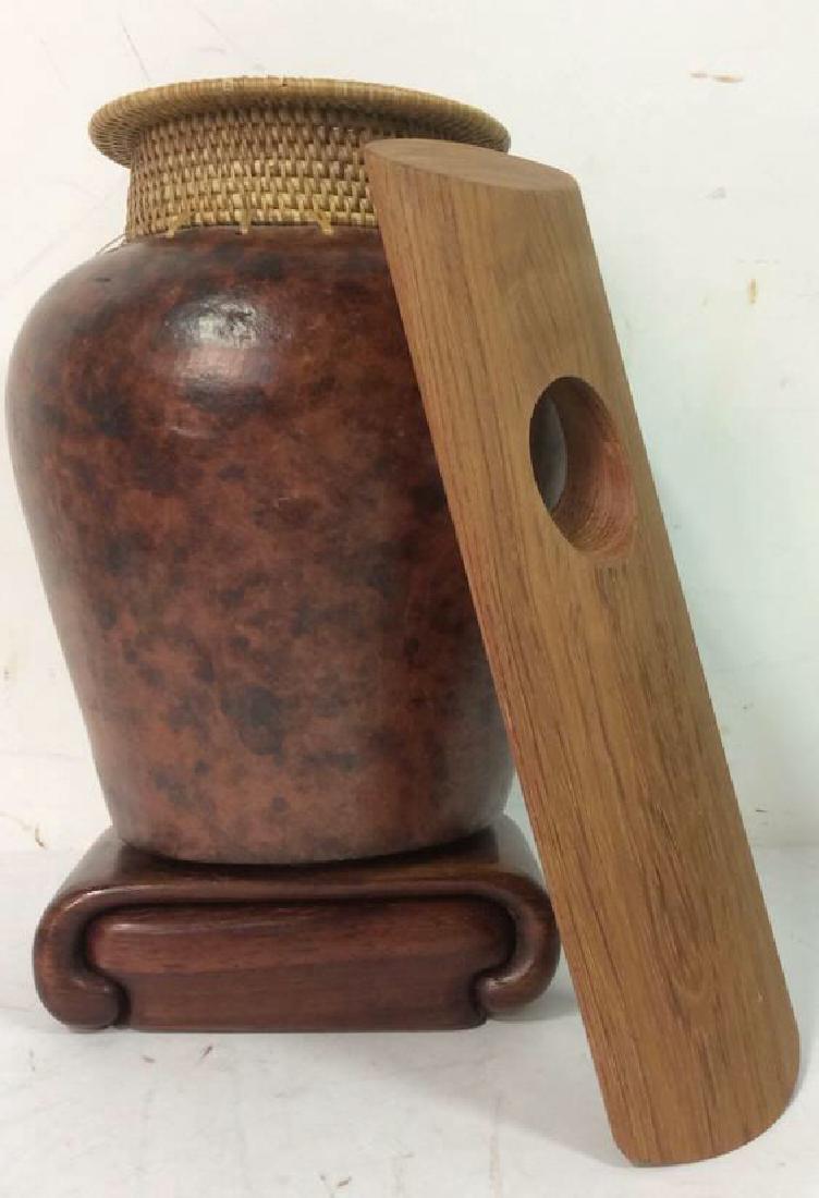 Lot 3 Table Tops Vase Trinket Box Wine Holder: Ceramic vase, Wine Holder, and wooden trinket box. Ceramic vase measures approx 9 inches tall 7 inches wide. Property of Scarsdale estate