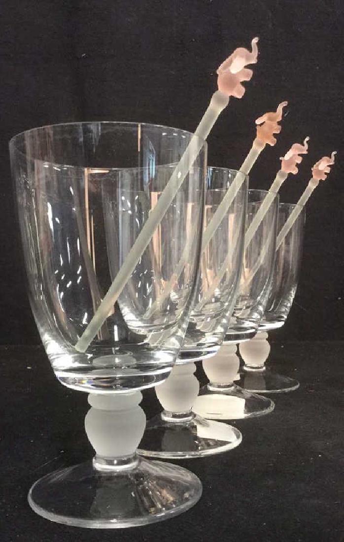 Group 10 Cocktail Accessories Glasses and Stirrers: Whimsical frosted pink elephant tipped stirrers. Each glasses measures approx 7 inches high 4 inches wide. Includes 4 glasses & 6 elephant stirrers.