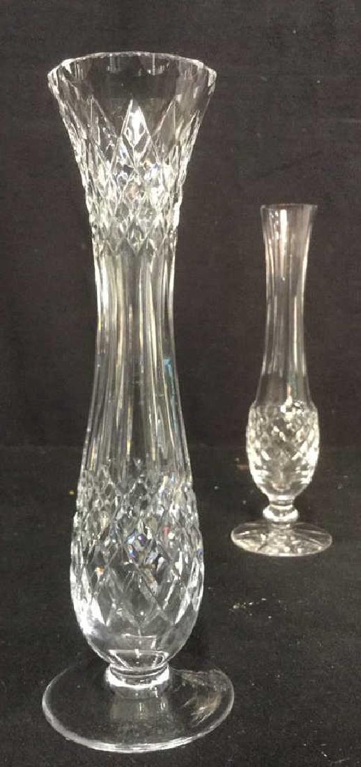 2 Crystal Vases: Lattice pattern crystal vases. Flower vase, table top vase. Larger Vase measures approx 11 inches tall 3 inches wide. No condition issues noted.