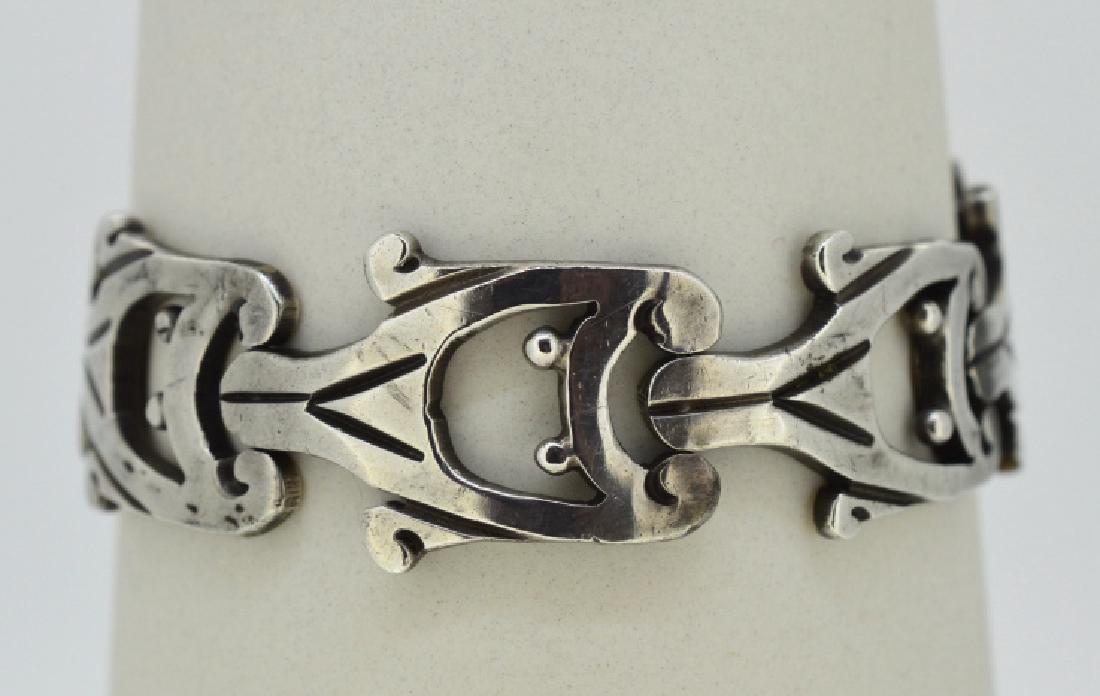 7 1/2" J. Flores Mexican Bracelet: Vintage bracelet is 1" wide and 7 1/2" Long, made of .925 Mexican Taxco Silver, 29.5 dwt