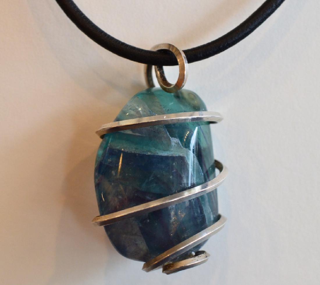 16" Blue/Green Apatite Choker Style Necklace: Lovely shades of blue and green apatite wrapped in sterling silver on 16" faux leather rope. Apatite stone is believed to promote repair of the physical body