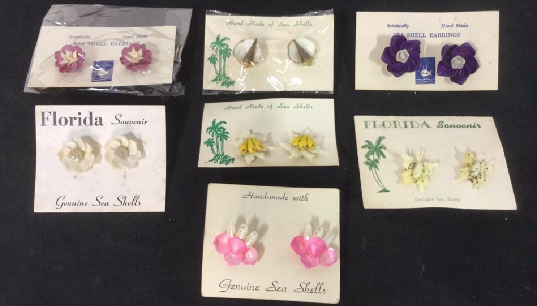 Lot 7 Vintage Estate Genuine Shell Earrings: Clip on earrings hand made from genuine sea shells. Pink earrings measure approx 1/2 inch diameter. Property of 1960's, 70's and 80's jewelry designer, importer and wholesaler with Nieman Marcus, Bloo