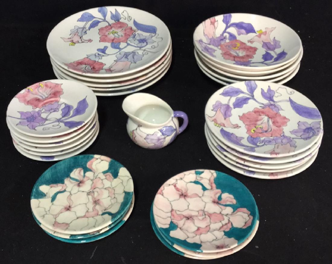 Group Lot 28 ERNESTINE SALERNO Pottery: Hand painted vintage Ernestine di Salerno made in Italy pottery. 5 dinner plates, 5 soup bowls, 5 salad plates, 6 saucers, 1 creamer - numbered 784R with pink and purple flowers. 6 bread/hors d'oeuvre