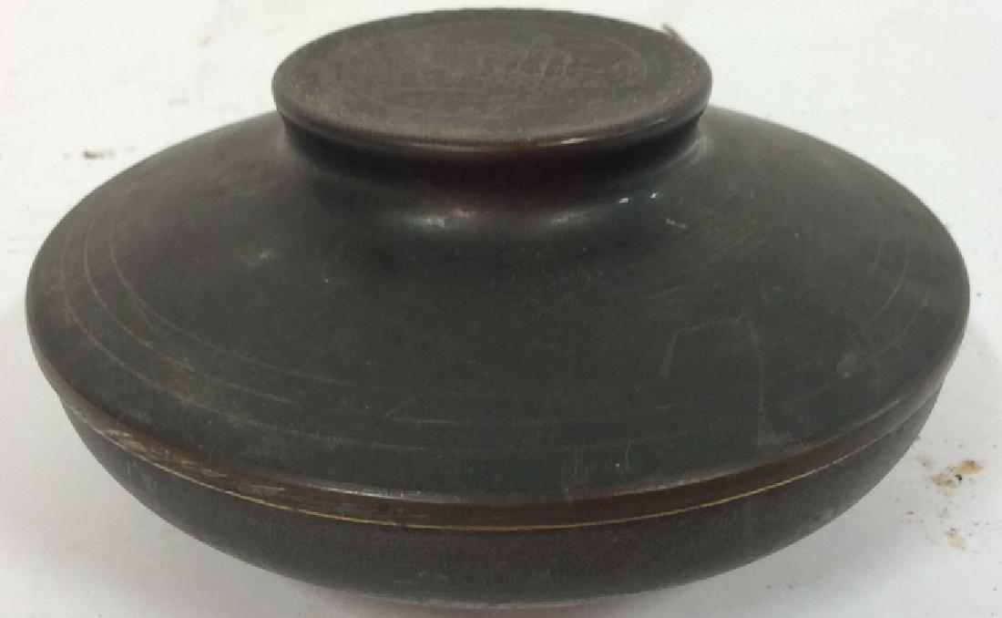 Israeli Trinket Box: Marked for Israel, marked for Jerusalem, possibly tin, lidded trinket box. Measure approx 5.5 inches diameter and 3 inches tall.
