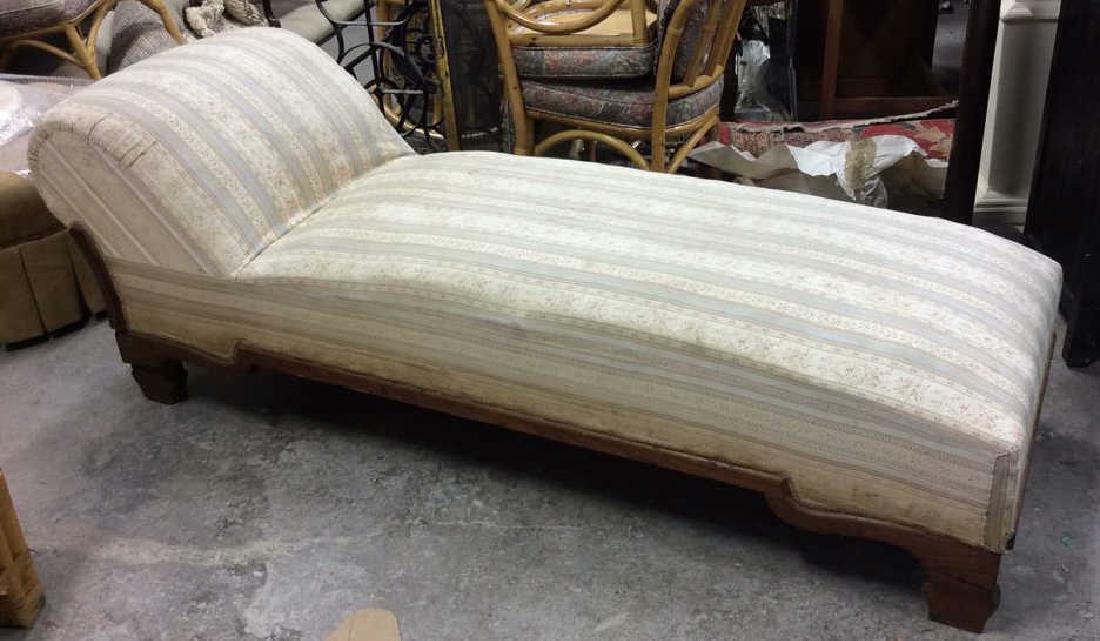 Antique Reclaimer Lounge Chair: Lounge chair, Reclaimer, Settee, sofa, fainting couch. antique carved wood frame. needs re uphokstery. property of Bedford Estate. length app 78 inches, ht 25 inches, width 26 inches. has casters.