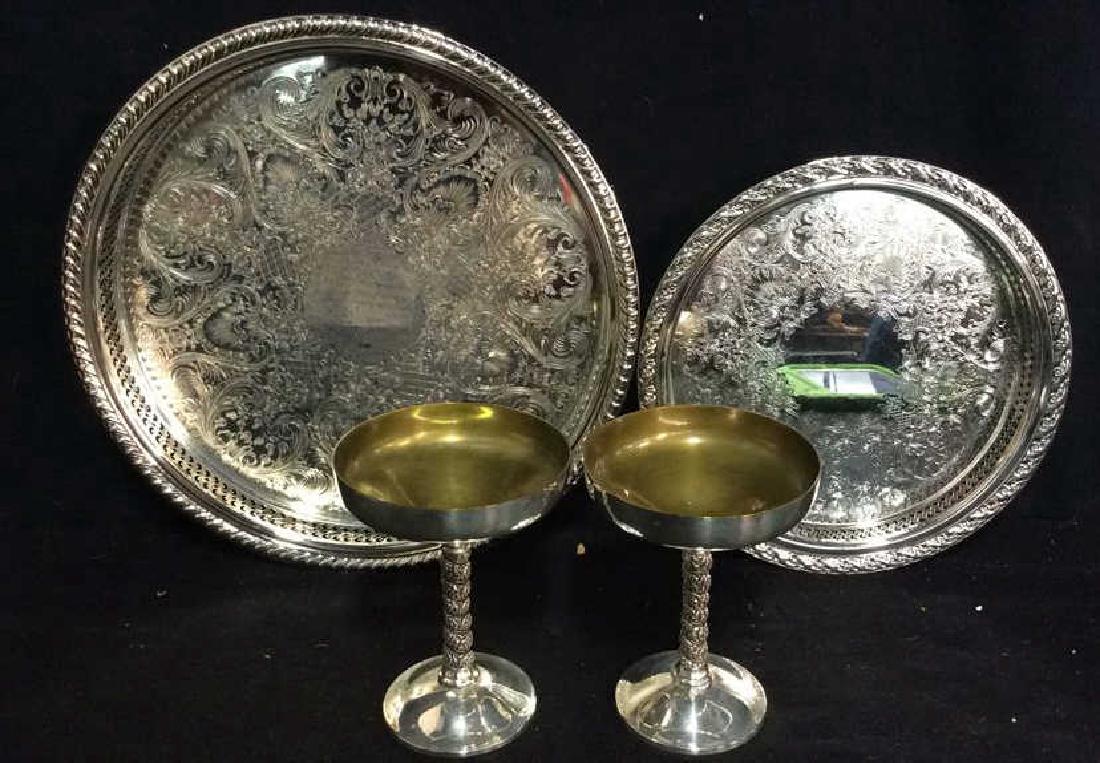 Lot 4 Silver Plated Cocktail Cups & Plates: Lot 4 Silver Plated Cocktail cups & Plates. Cocktail cups have gold toned interior. Plates Embossed with floral motif. Largest plate measures approx 11 inches diameter.