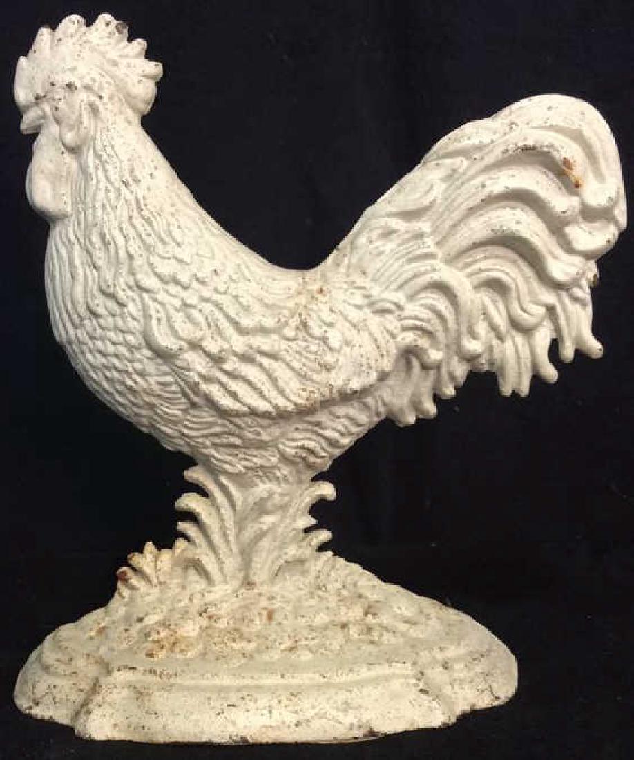 Brass Rooster Door Stop: Vanilla cream white toned pedestaled rooster doorstop. Measures approx 12 inches tall 12 inches wide.