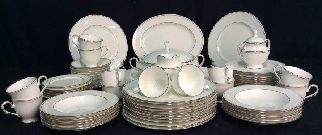 Lot 76 LENOX CLASSICS COLLECTION China: Includes 12 teacups, 12 dinner plates,, 12 soup bowls, 2 large serving platters, 1 mid size serving platter, 11 teacup saucers, 12 salad plates, 11 bread plates, 1 lidded & handled sugar, 1 creamer, a