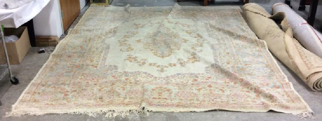 Aubusson Pink Toned Rug: Aubusson Circa 1980 Rug, Origin India has pink, periwinkle and yellow toned with fringes. Oval medallion detail in center. Floral motif detail. Rug measures approx 143 inches long 116 inches wide.