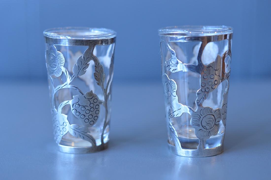 Pair of Shot Glasses with Silver: Made in Mexico, 2 1/2" high shot glasses with sterling silver trim