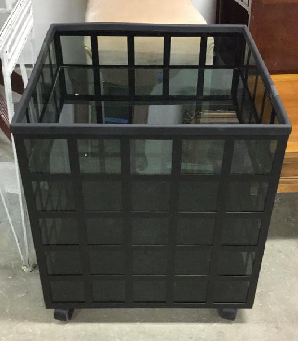 Black Toned 3 Level Bar Cart W Doors: Black Toned 3 Level Bar Cart, Tea Cart, Beverage cart W Doors. Cube shaped. Glass and metal structure, structure. Some discoloration, otherwise no other condition issues noted. Measures approx 24 inch