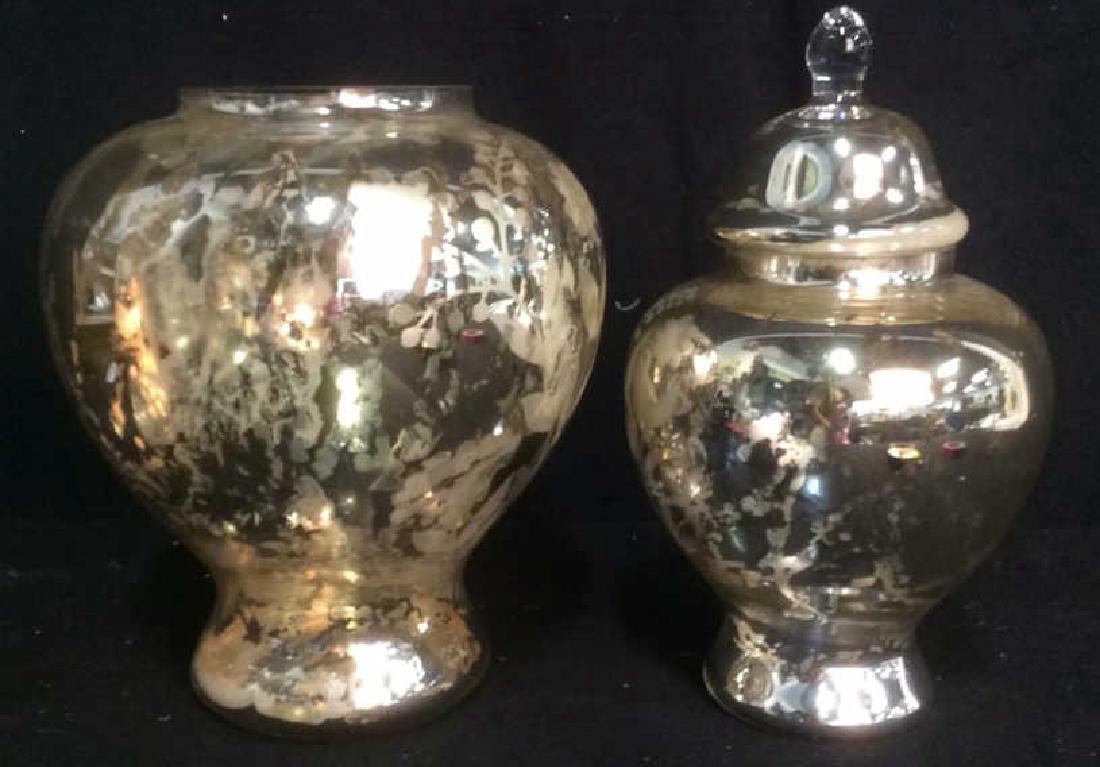 Mercury Glass Vase and Ginger Jar: lidded ginger gar with floral and abstract patterning measures ht 12 inches. mercury glass vase ht 10.5 inches diameter 9 inches.