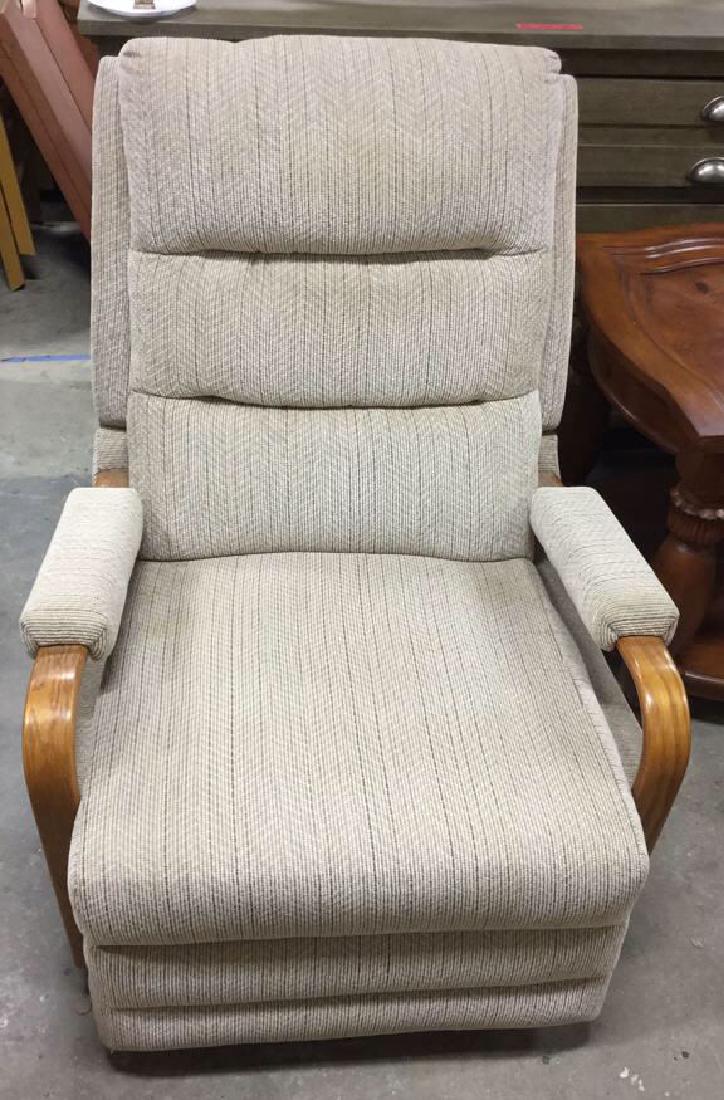 Vintage Recliner Rocking Chair: Vintage chair with both rocking and reclining functions. Wood arms, chenille-like fabric. Measures approx 39 inches H x 28 inches W x 31 inches D (54 inches when extended). Small stain on seat, otherw