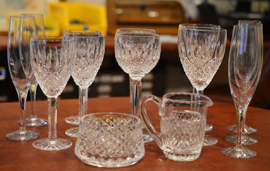 Lot of Mixed Waterford & Crystal Glasses: Lot includes (3) 8" wine glasses and (2) 9" wine glasses in Arianne Design, (2) 8" wine glasses in Colleen Design, Set of Waterford sugar & creamer decanters, set of 5 Orrefors 9" matching fluted cham