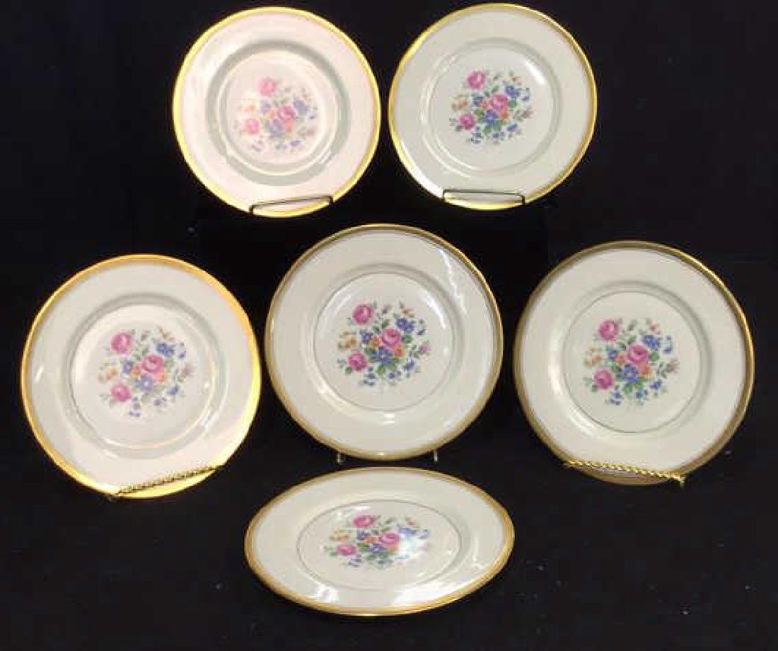 Set of 6 Theodore Haviland Plates: Tabletop Accesssories, China , Porcelain, Set of 6 Theodore Haviland Plates with floral center and gold toned rims. Stamped and numbered on back Theodore Haviland New York Made in America Windsor. Ver