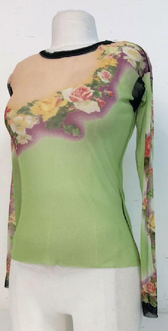 VERSACE Sheer Mesh Floral Shirt: Missing label. Sheer, mesh floral shirt with green and peach tones with illustrative floral design. Measures approx 20 in tall with 20 in sleeves, measures approx 14 in from shoulder to shoulder. Vers