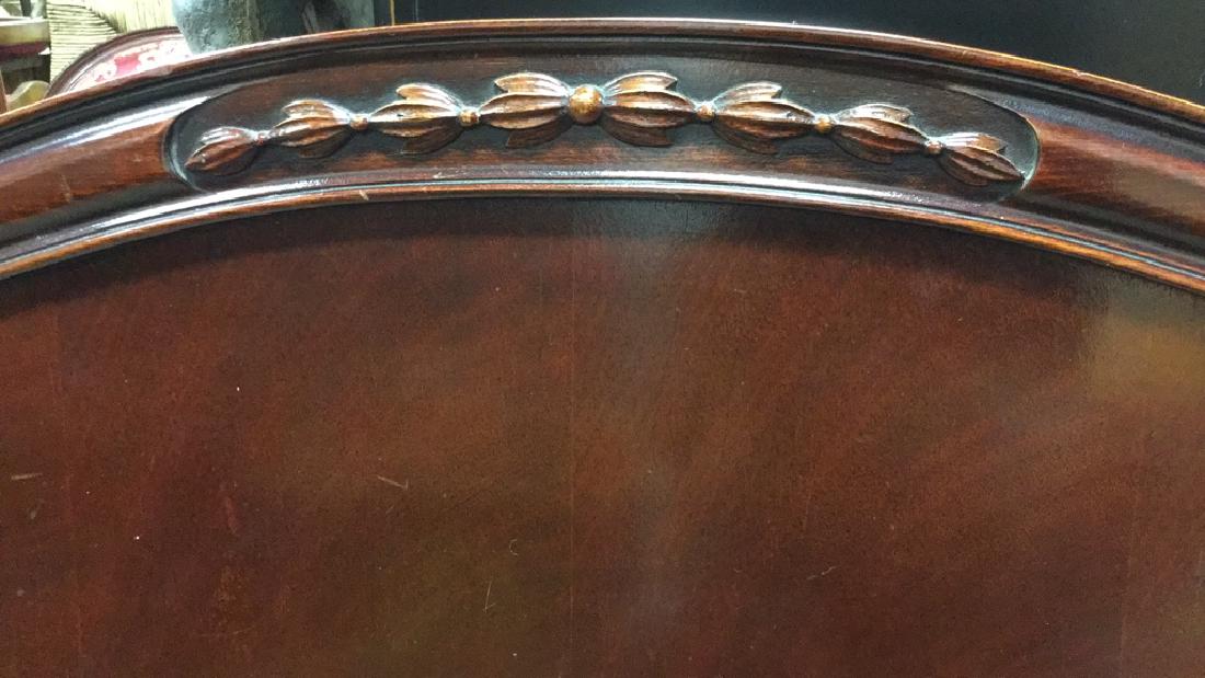 Vintage Carved Wood Headboard & Footboard: Vintage, possibly antique, wood headboard and footboard, possibly mahogany with decorative carved trim. 3 wooden slats included. Headboard measures approx 41 inches H x 56.5 inches W. Footboard measur