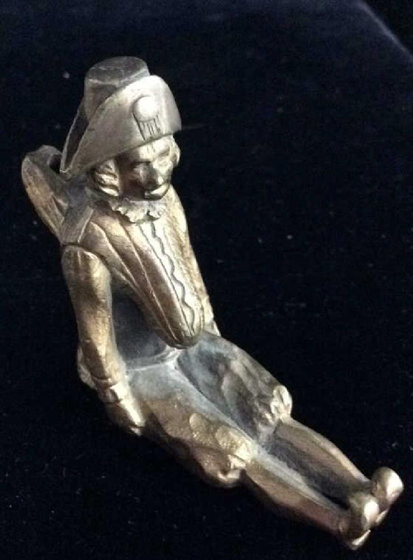 Formed Metal Sitting Female Male Figurine (1 of 8)