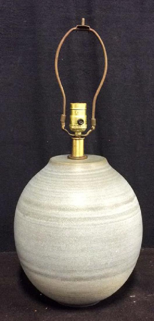 Mid Century DESIGN TECHNICS Ceramic Lamp c1950s: Mid century DESIGN TECHNICS Lee Rosen era ceramic, terra cotta, lamp circa 1950s. Blue toned painted ceramic lamp with horizontal dark toned striations. Measures approx 22 in tall by 10 in in diameter