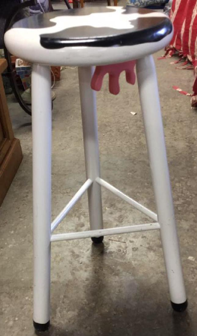 Vermont Sled Company Signed Cow Stool With Udders: Vintage Cow stool, wooden stool, kitchen stool, end table, plant stand, painted black and white with pink udders. Measures approx 28.5 Inches H x 16 inches W. Seat diameter measures approx 12.5 inches