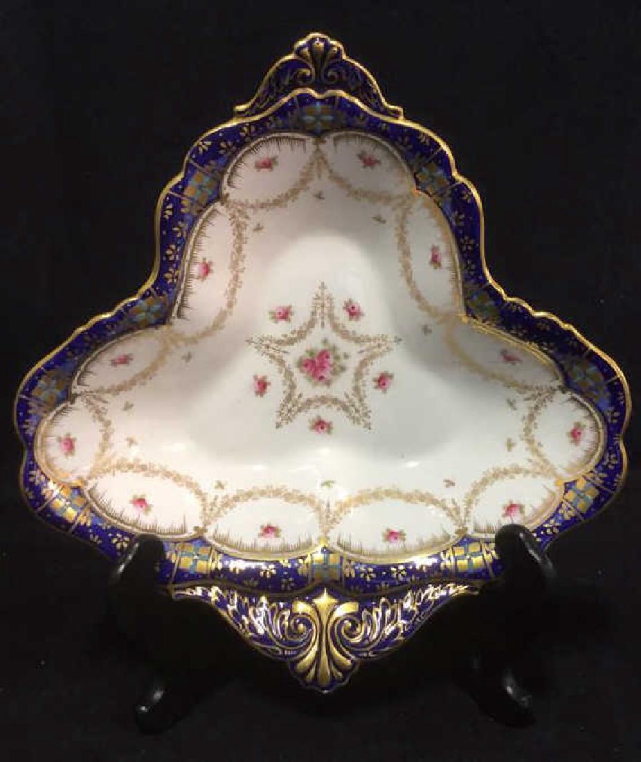 Paragon England Bone China Display Bowl: Vintage possibly antique porcelain, English, Decorative Display Dish, Table top accessory, Paragon England Bone China Display Bowl. Bowl has cobalt blue rim and pink rose motif , with Hand painted, go