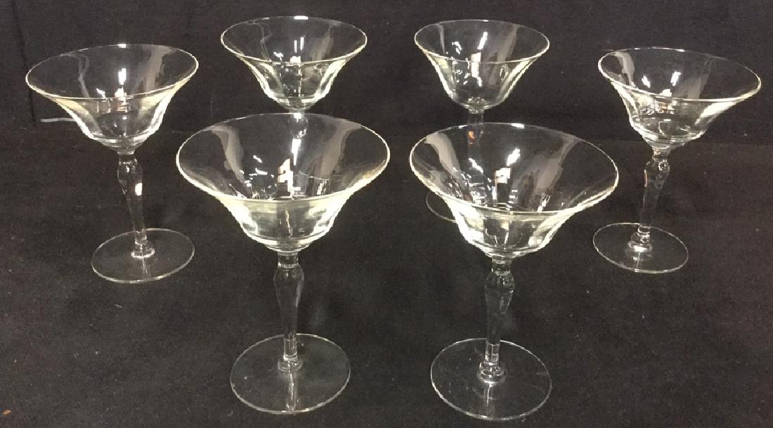 Lot 6 Vintage Wine Champagne Glasses/ Crystal: Lot 6 Vintage Wine Champagne Glasses possibly crystal. Bar ware. Holiday entertaining . A Delicate set of holiday glass/crystal glasses. All slightly different. Small flea bite to one glass rim. Measu