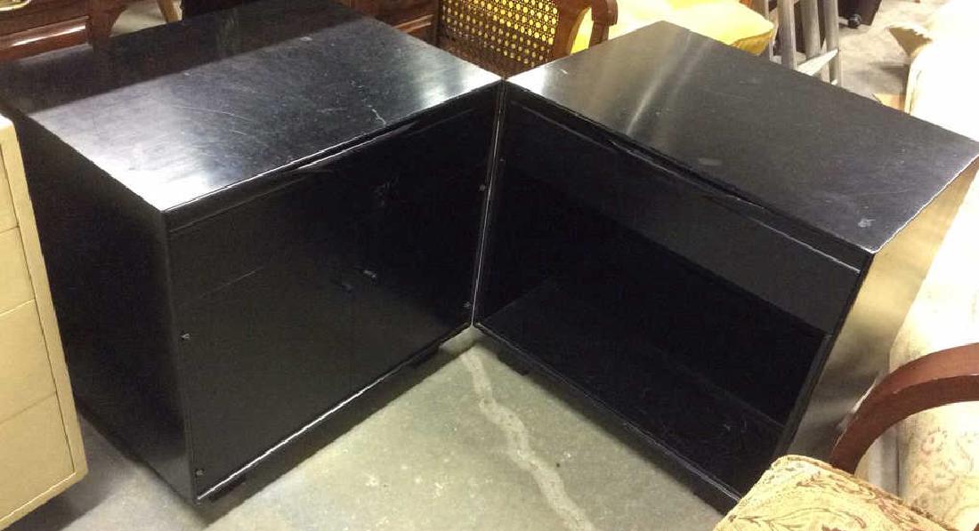 2 JOHN STUART INC. Wooden Night Stands: Black toned Wooden Night Stands marked JOHN STUART INC NEW YORK. 1 contains drawer and 2 door cabinet space, the other contains 1 drawer and no cabinet. Nightstand, wooden nightstand, black nightstand