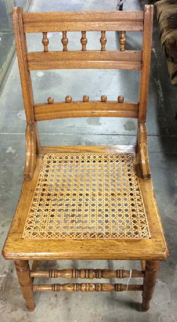 Wooden High Backed Chair W Woven Basket Caned Seat: Wooden High Backed Chair W Woven Basket Seat. Light toned wooden chair with high back. Measures approx 33 in tall by 16 in by 16 in.