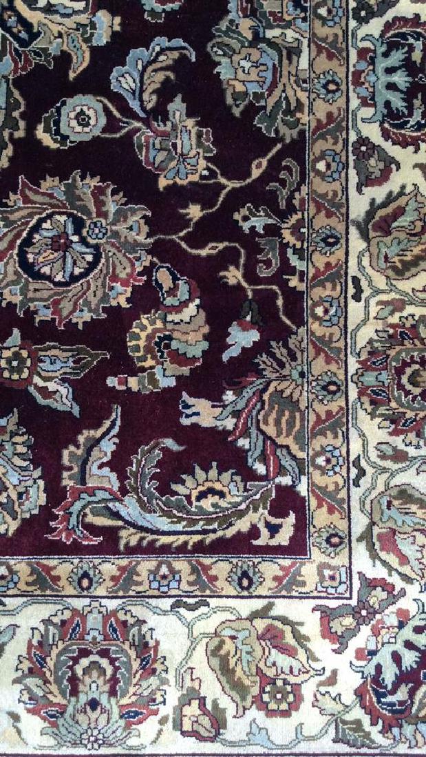 Handmade Ruby Toned Fringed Rug (1 of 9)