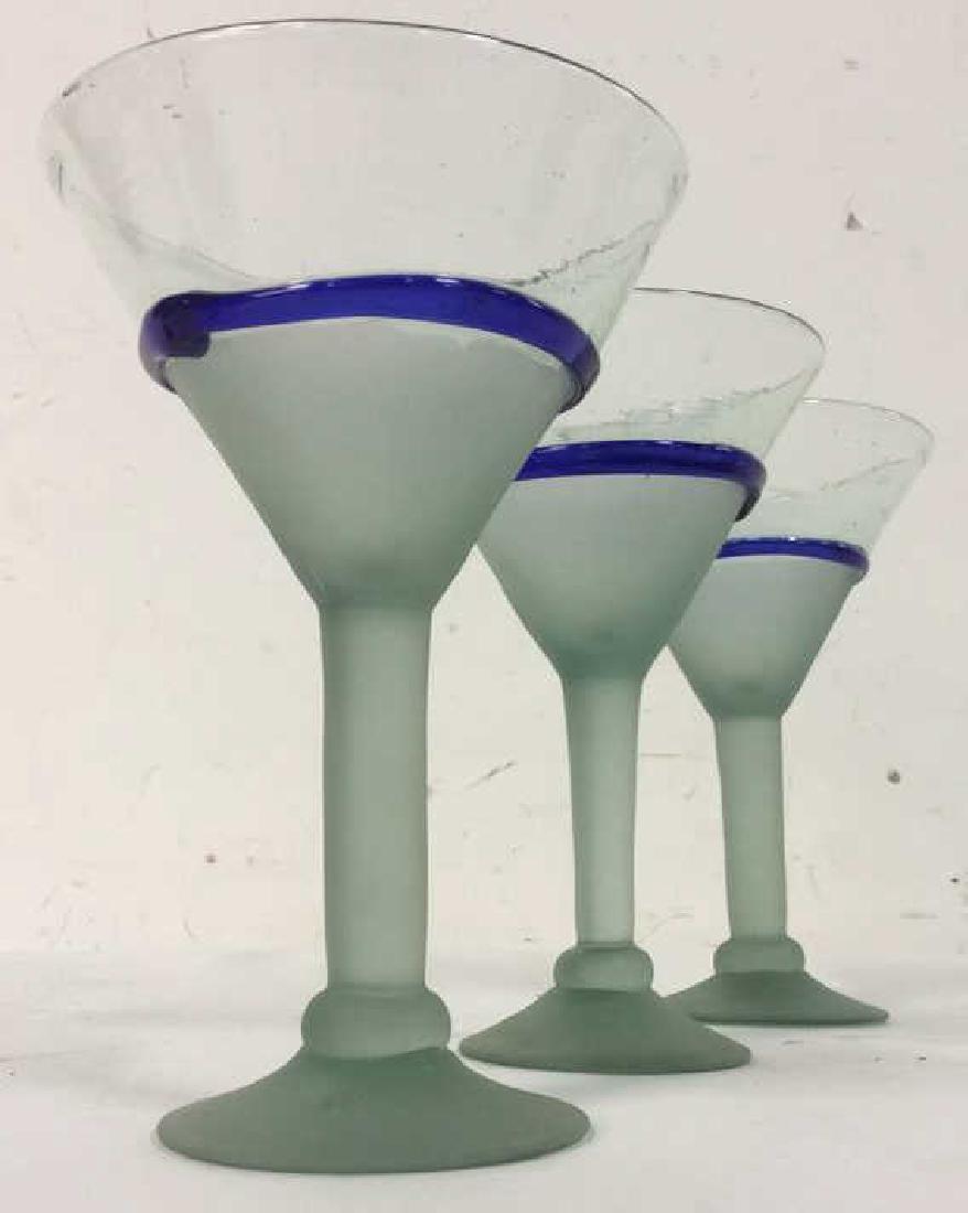 Hand Blown Cocktail Glasses: Hand Blown Cocktail Glasses with frosted lower half and blue toned stripe. Matching cocktail glasses, frosted cocktail glasses, hand blown cocktail glasses. Measures approx 7.5 inches tall 5 inches di