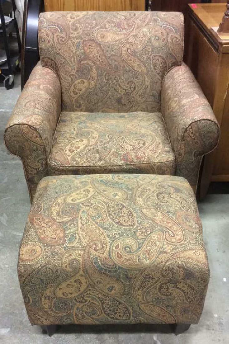 Lot 2 Multi Toned Matching Armchair & Ottoman: Multi Toned Matching Armchair & Ottoman. Contains tones of Green, Red, and gold. Contains intricate flower relief detail design. Matching armchair & ottoman, Floral motif armchair, multi colored armch