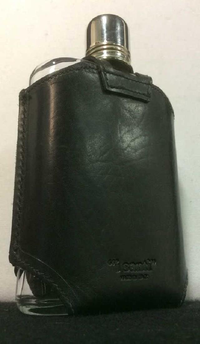 I SANTI Glass Flask W Italian Leather Cover: Black toned leather cover reads I SANTI MADE IN ITALY. Glass flask has silver toned cap. Measures approx 6 inches tall 4 inches wide.