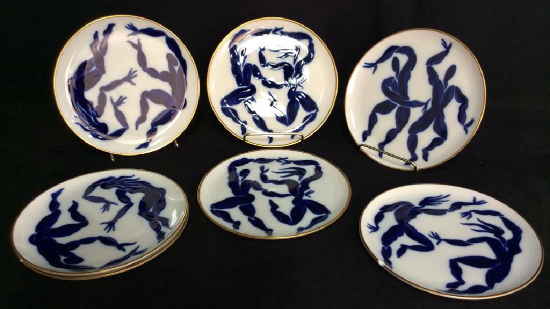 Lot 7 BERNARDAUD LIMOGES France Salad Plates: Lot 7 BERNARDAUD LIMOGES France Salad Plates and cabinet, display shelf. Herve van der Straeten designs. Plates feature blue toned dancing figures. Matisse Like Dancing Figures, Two plates featuring A