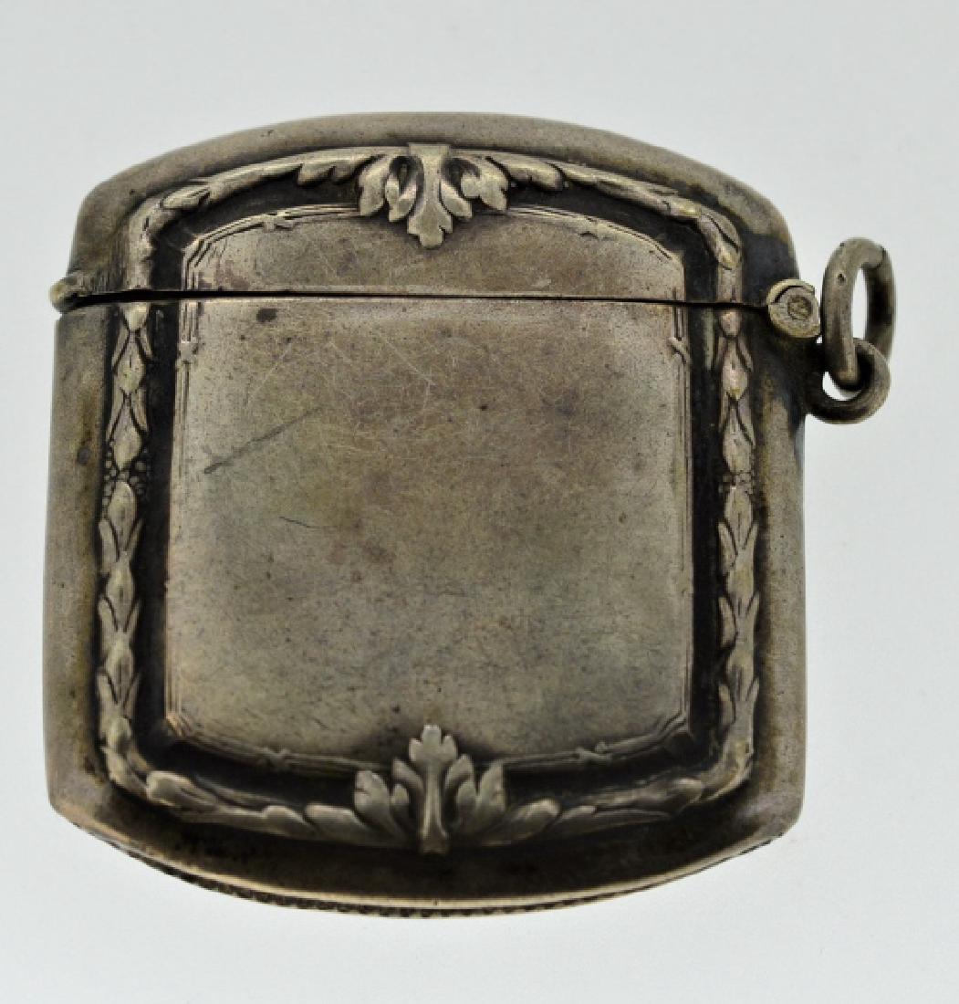 19th Century Silver Match Safe: .800 silver, square shape with embossed design, has dent on one side, 9.7 dwt, approx 1 3/4" x 1 3/4"