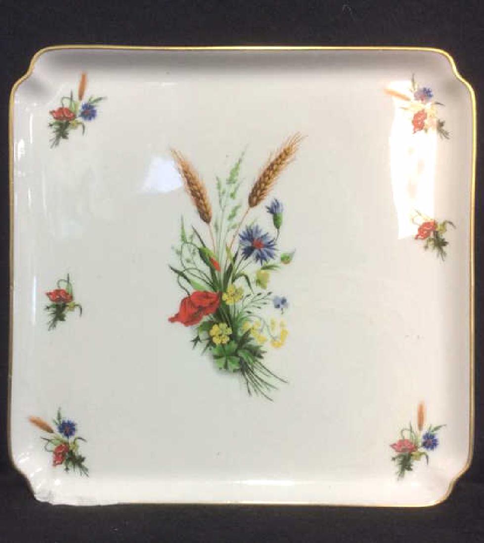 LIMOGES FRANCE Porcelain Painted Serving Dish: Marked LIMOGES FRANCE on underside. Contains painted floral detail. Contains some fractures and chips. Rim of dish is gold toned. Measures approx 8.5 inches square. Made in France Table top decor, dec