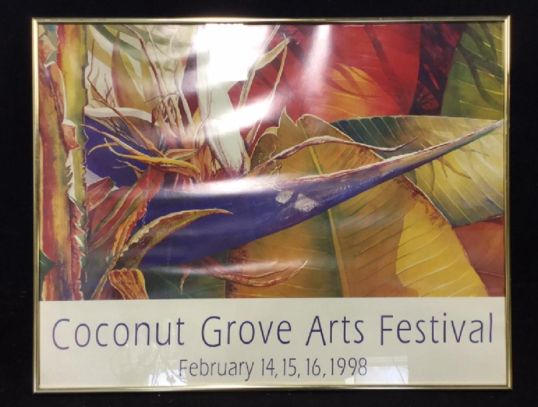 Framed Artwork Coconut Grove Arts Festival: Poster in gold colored frame titled Coconut Grove Arts Festival February 14-16, 1998, Signed Carmen Logos 1997. Professionally framed. No condition issues noted. Measures approx 22 inches H x 28 inche