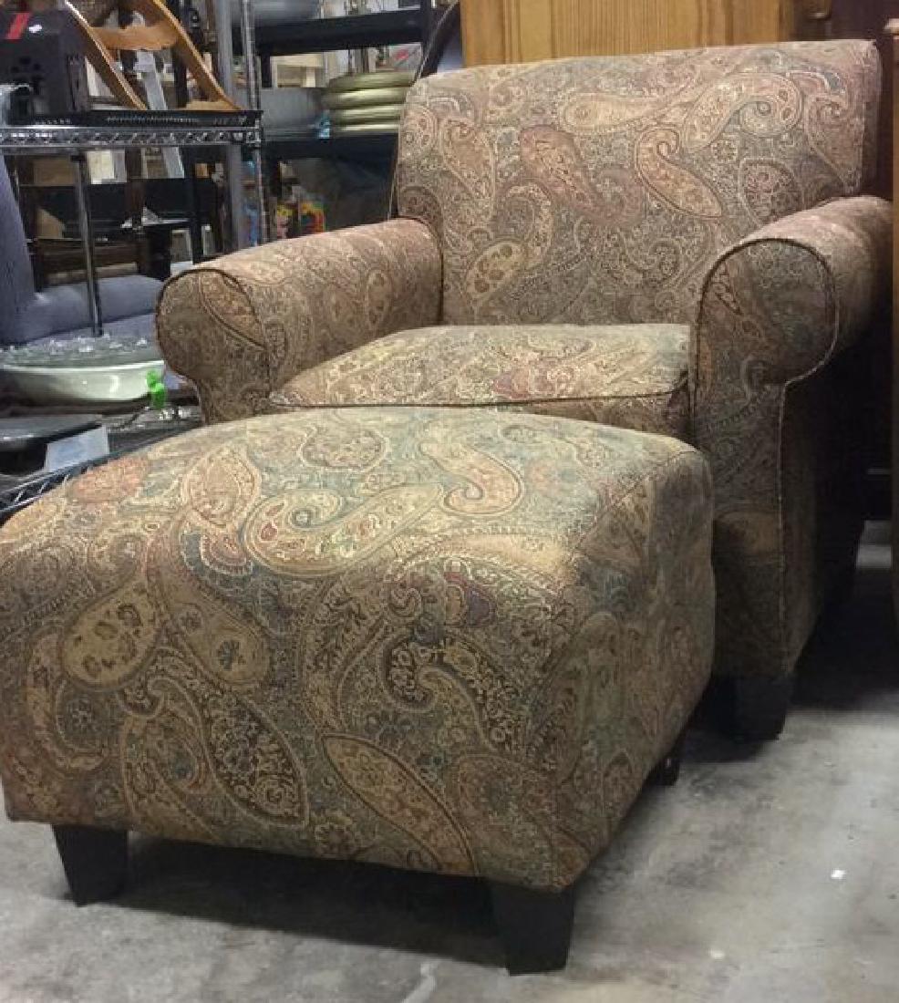 Lot 2 Multi Toned Matching Armchair & Ottoman: Multi Toned Matching Armchair & Ottoman. Contains tones of Green, Red, and gold. Contains intricate flower relief detail design. Matching armchair & ottoman, Floral motif armchair, multi colored armch
