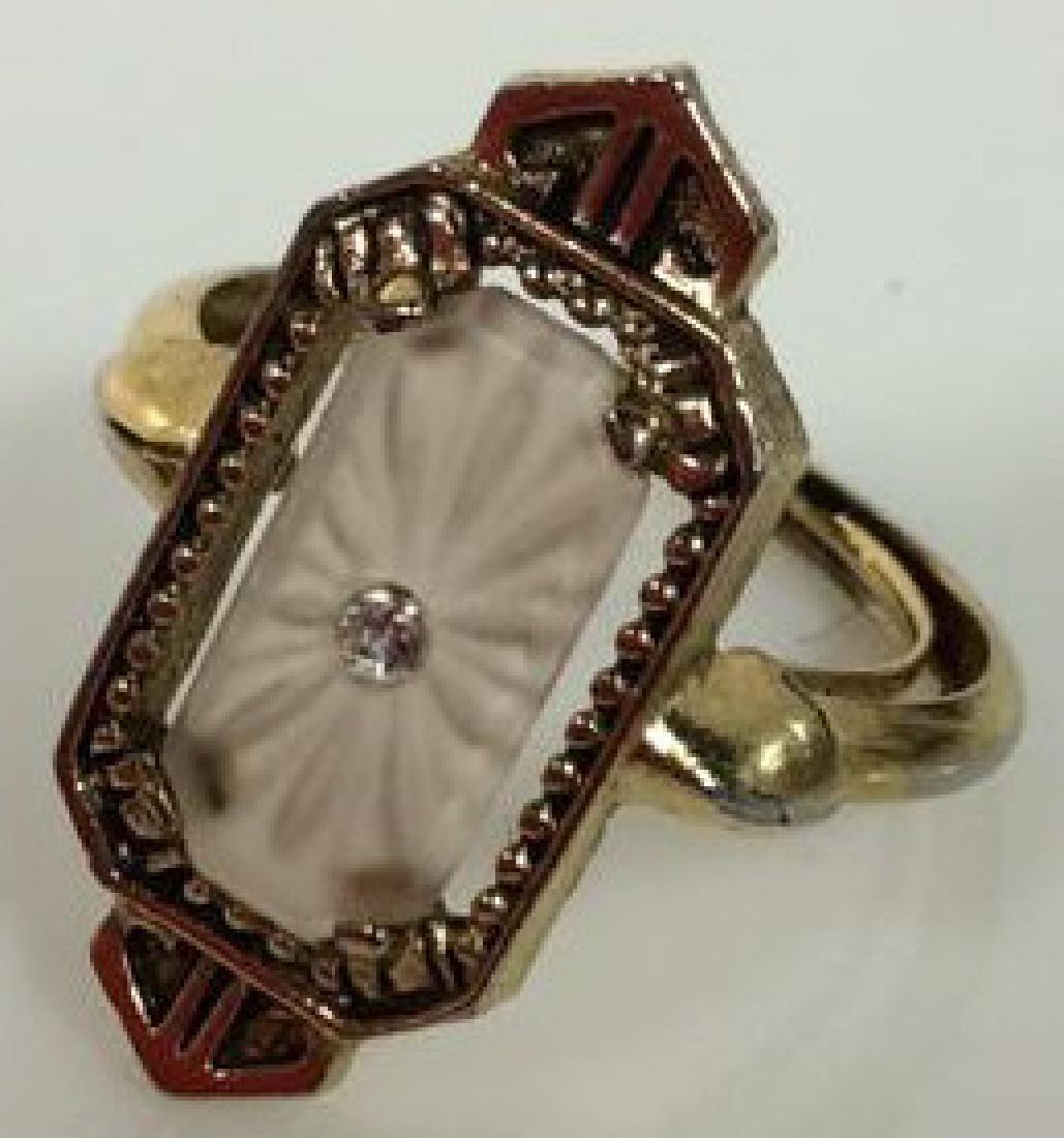 AVON Gold Toned Metal Art Deco Ring: AVON Gold Toned Metal Art Deco Styled Ring with glass centerpiece and rhinestone. Marked as AVON. Ring fits approximately a size 6. Vintage Jewelry, Estate Jewelry,